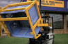 fork mounted bin tipper